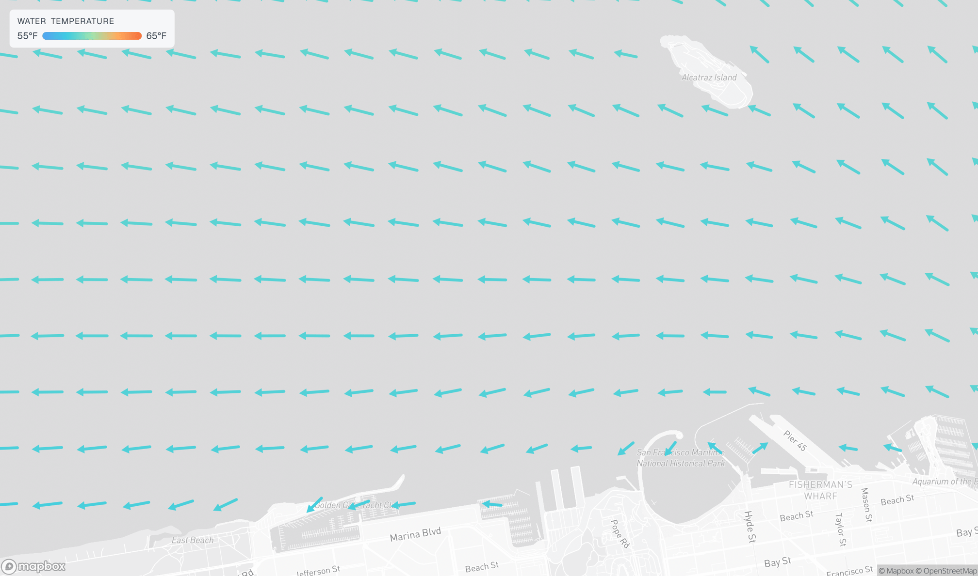 A map of the waters off San Francisco's Marina District and Alcatraz Island overlaid with a grid of arrows indicating water temperature and current direction, indicating a current towards the west, with a water temperature scale ranging from 55°F to 65°F in the upper-left corner.