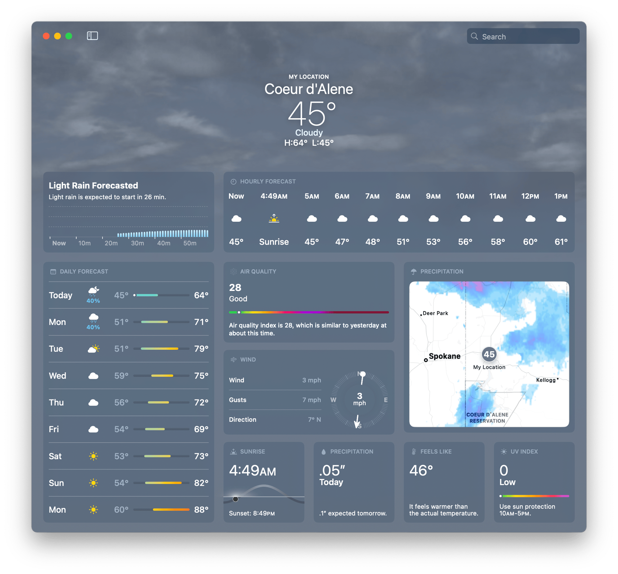 A screenshot of the MacOS weather app, showing the forecast for Coeur d'Alene. It shows a current temperature of 45°F with cloudy conditions, with a high of 64°F and a low of 45°F. Light rain is expected to begin in 26 minutes.